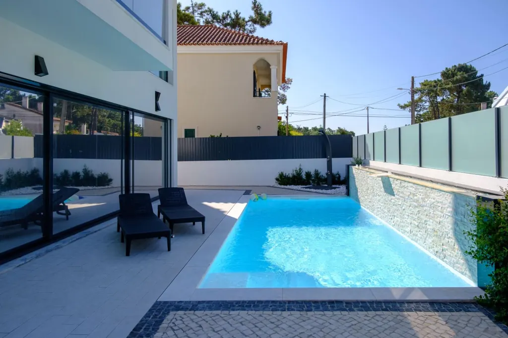 Pool and terrace at the Aroeira villa