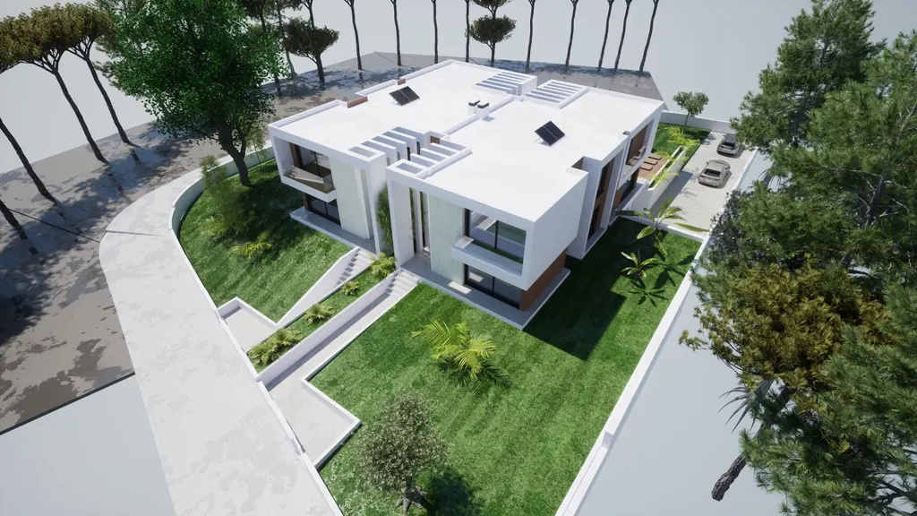 Aerial view of the villa surrounded by pine trees